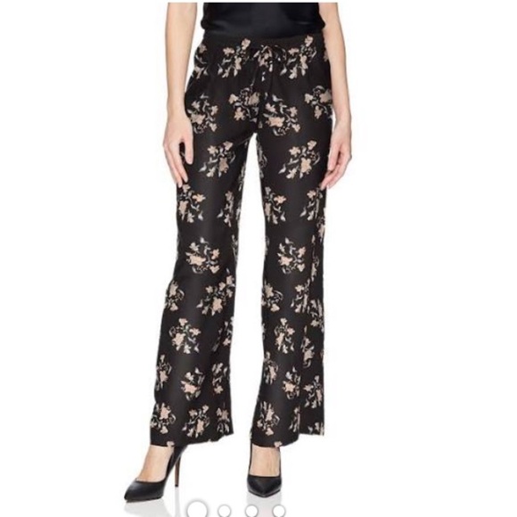 5. Add some WOW to your closet!!!!!!Calvin Klein Floral Wide Leg Pants in Black - Picture 3 of 16